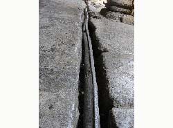 Lead pipe in Roman bath in Bath, Somerset, England